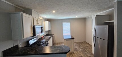 Building Photo - 209 Magnolia Pl