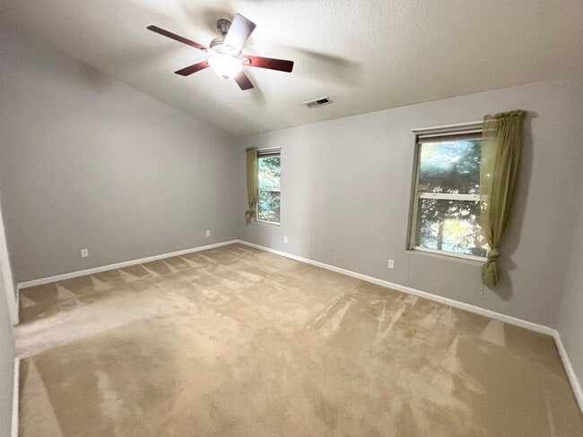 Building Photo - Stunning Remodeled Home with Office, A/C, Fenced Yard & Flexible Living Space!