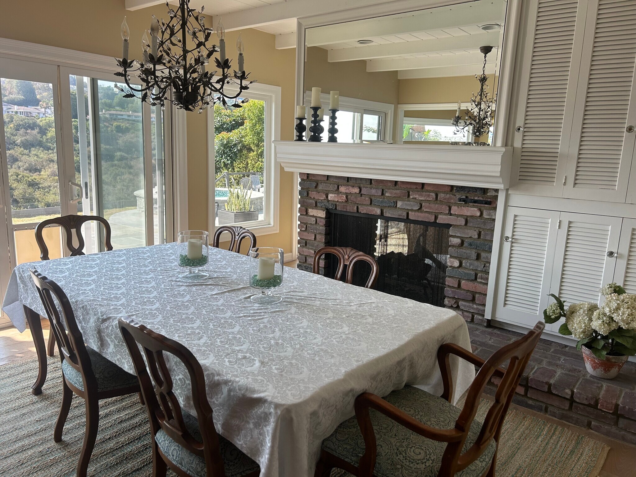 Formal dining room with storage, views , and fireplace - 27078 Sunnyridge Rd