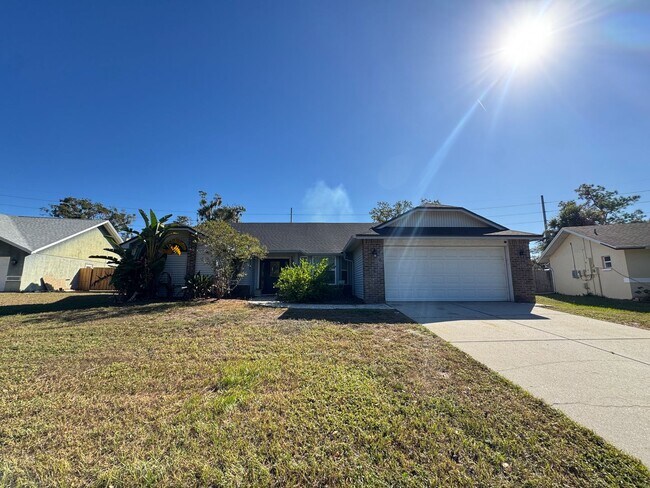 Building Photo - Your Dream Home Awaits! MASSIVE Backyard! ...