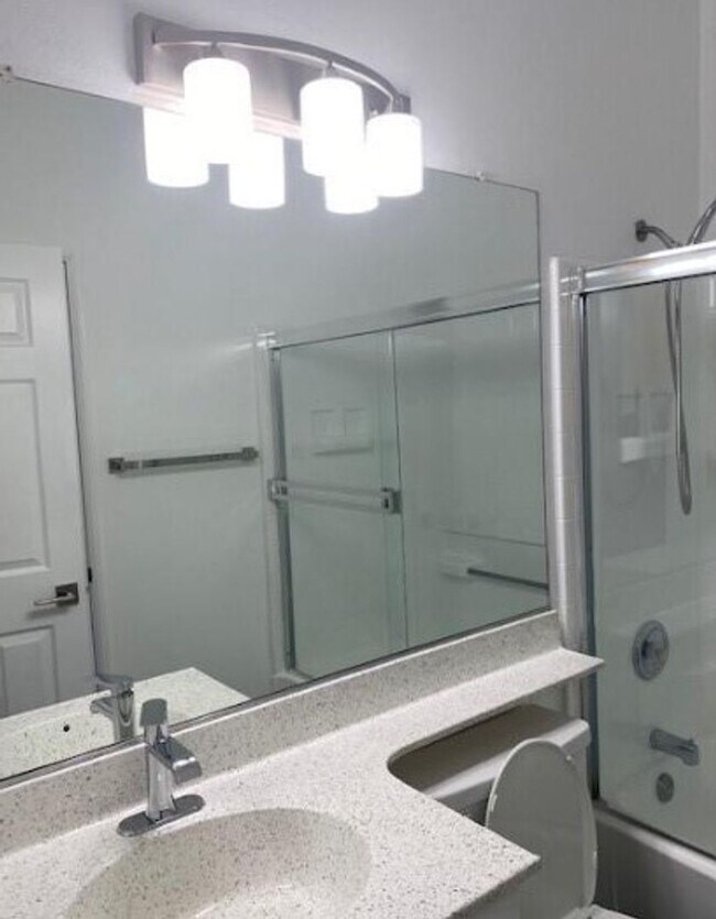 Building Photo - Step into luxury living with this exquisite 2 bedroom 2 bath 3rd floor condo at Emerald Villas