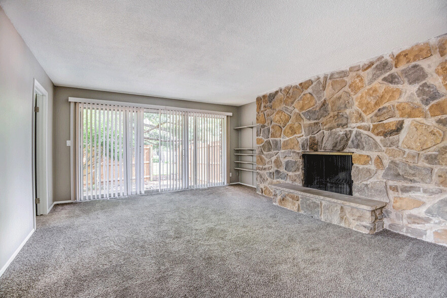 Living room leads to private patio /balconey. - Corinth Valley