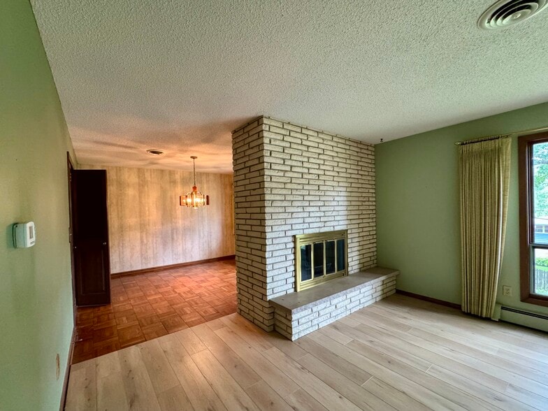 Living looking into dining room - 4007 Grimes Ave S