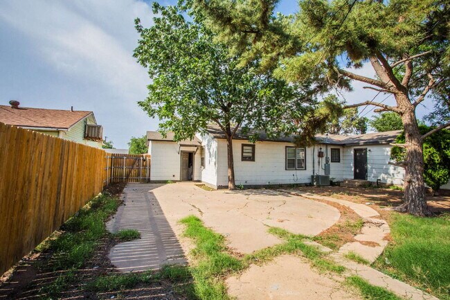 Building Photo - "Charming 4-Bedroom Home with Granite Touches & Gleaming Hardwood Floors in Lubbock!"
