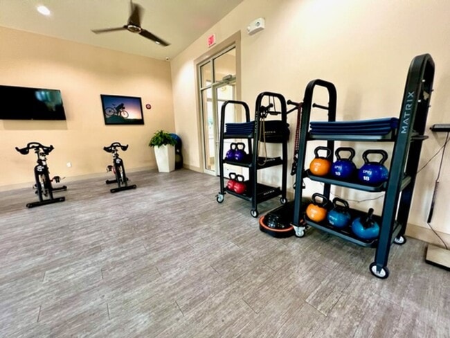 Building Photo - EAGLE CREEK LAKE NONA! WELCOME HOME! Beautiful water views! Spacious 2 story-3 bedroom 2.5 bath h...