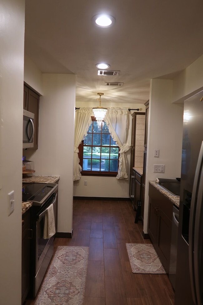 Building Photo - Prime Location to Haile Village