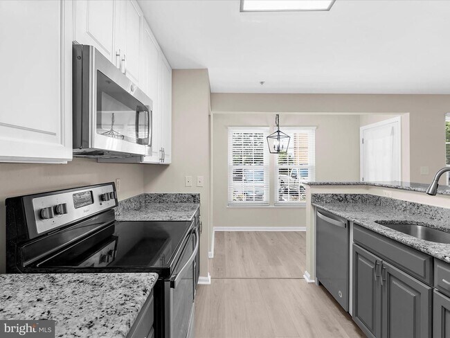 Building Photo - Ground Level Condo in Piney Orchard -Odenton