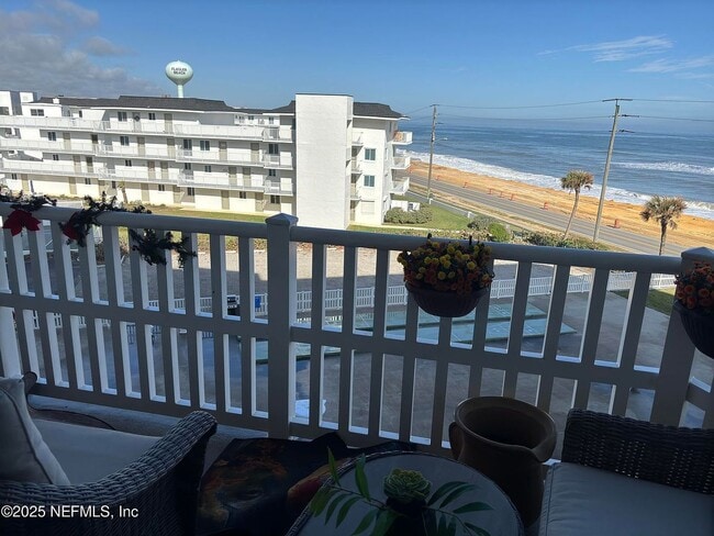 Building Photo - LIFE'S A BEACH- FULLY FURNISHED at the Nau...