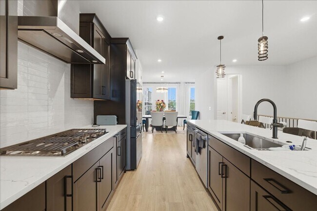 Building Photo - Welcome to this stunning, newly built 2025 townhome nestled in the heart of Brambleton