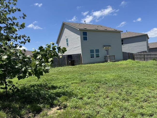 Building Photo - Like new 4/2.5 home (2023) in Morgan Heights with loft and big yard