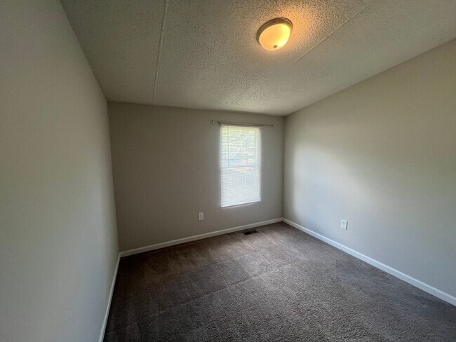 Building Photo - Introducing a charming 4-bedroom, 2-bathroom house in the desirable Gastonia, NC area
