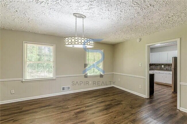 Building Photo - Move in before December 31st and choose your reward: a $250 Amazon Gift Card or a 55" Smart TV!