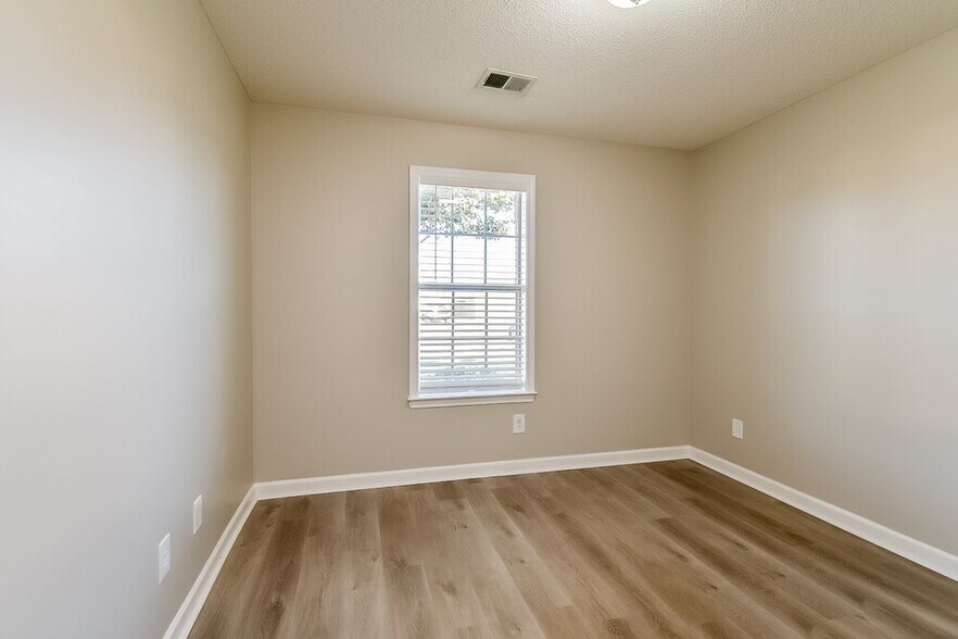 Building Photo - 7843 Plantation Ridge Cove