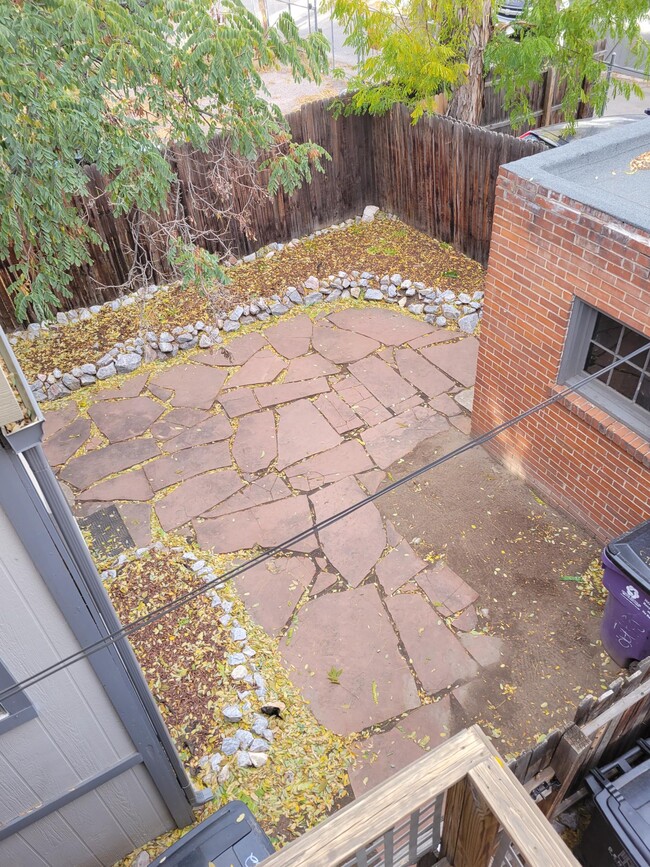 Private fenced flagstone patio - 1132 N Ogden St