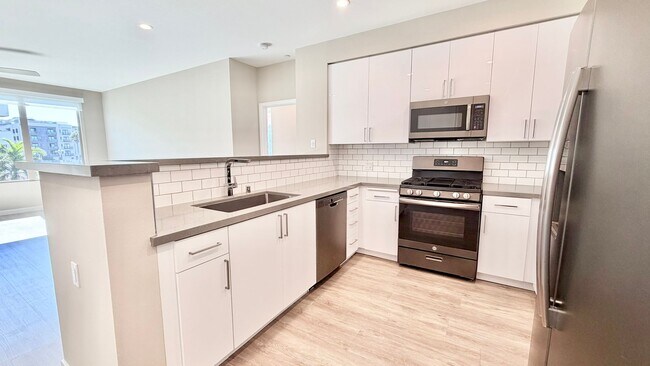 Building Photo - Brand New High-Rise Condo Unit with Stunning Community Amenities, Ocean Views, & MORE!