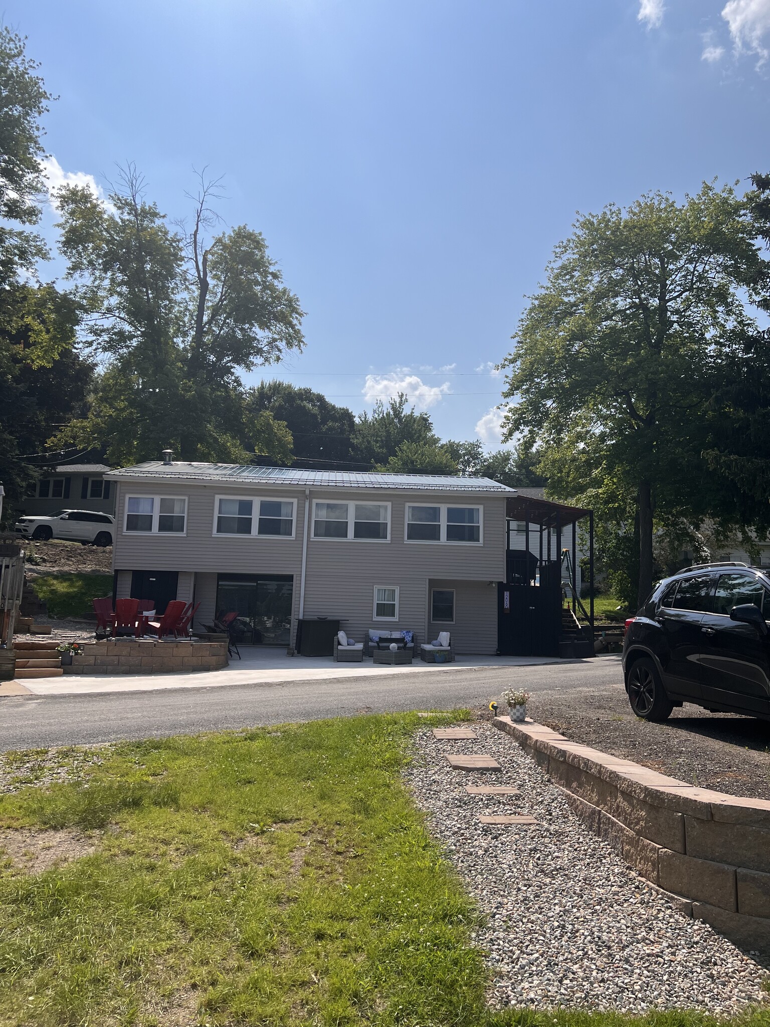 2 parking spots lakeside, the 3rd is behind the house where the white SUV is - 12060 Mac Dr NE
