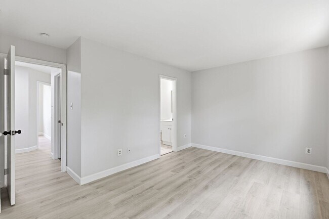 Building Photo - Experience contemporary living in this beautifully renovated residence where modern design meets ...