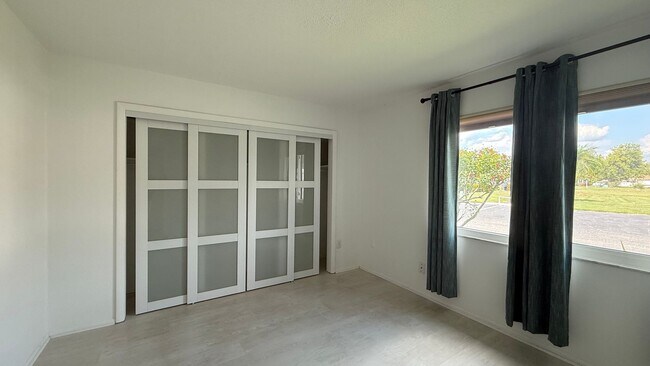 Building Photo - All inclusive 2BR/ 2B Condo in 55+ Community
