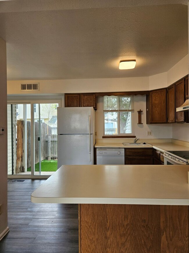 Building Photo - Adorable Loft Style One Bedroom Condo Steps from Buckley AFB