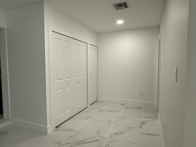 Hallway w/Storage - 8700 SW 193rd Ter