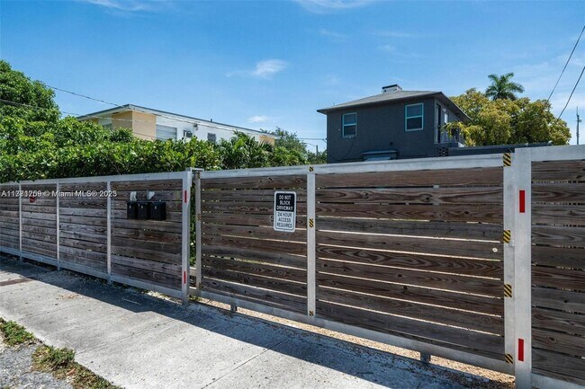 Building Photo - 6221 NW Miami Ct