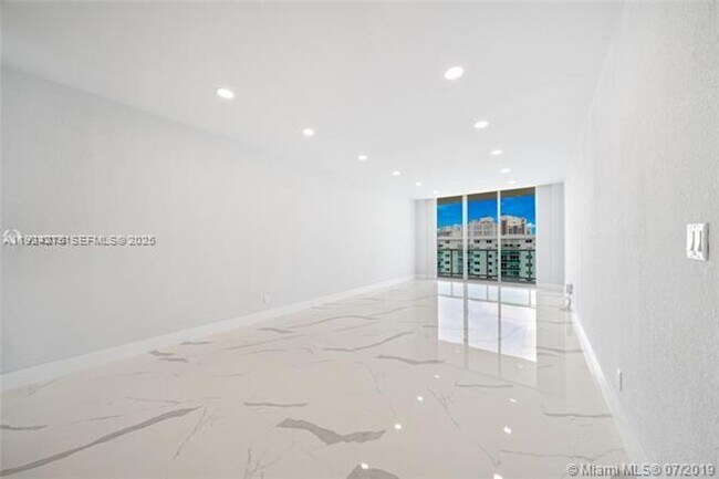 Building Photo - 19390 Collins Ave