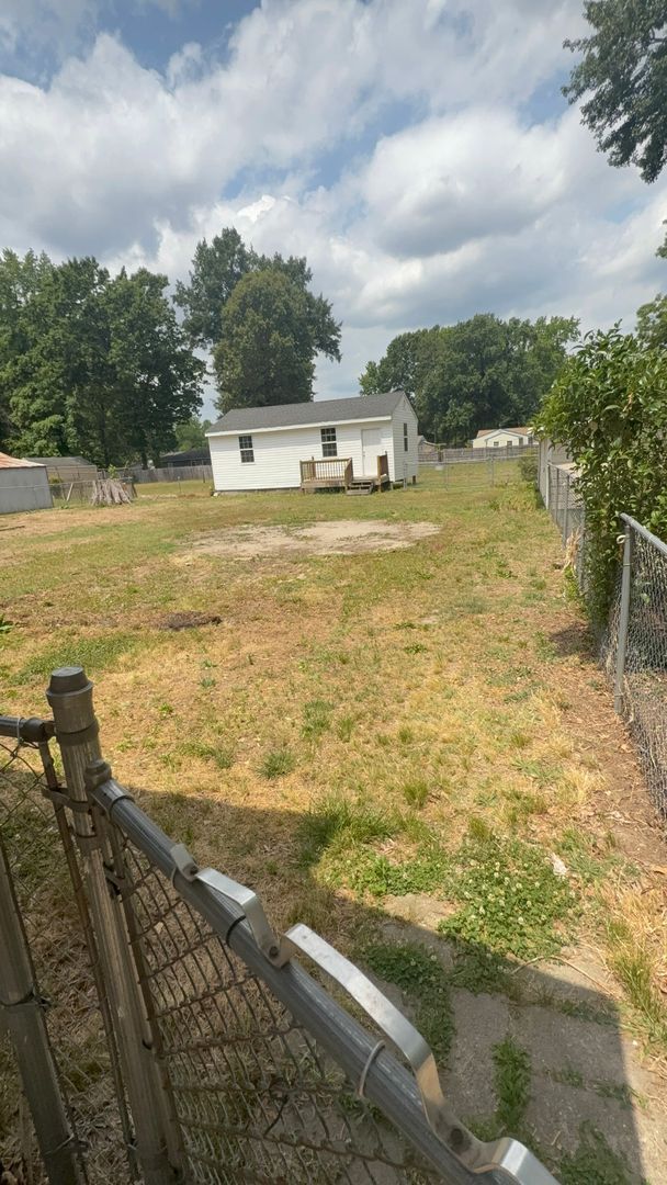 Building Photo - 2-bedroom 1 bathroom Cottage on a large lot with 2 large storage building on site