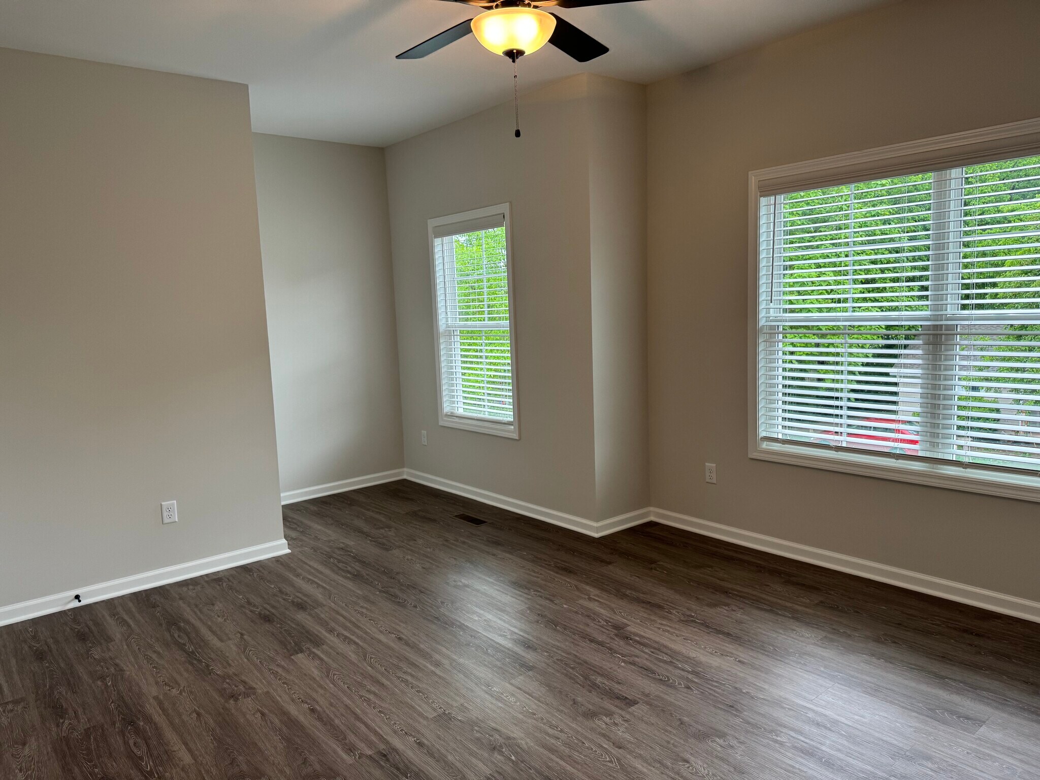 Bedroom Two offers a private full bath, personal closet, and plenty of natural light—perfection - 205 Cherry Way