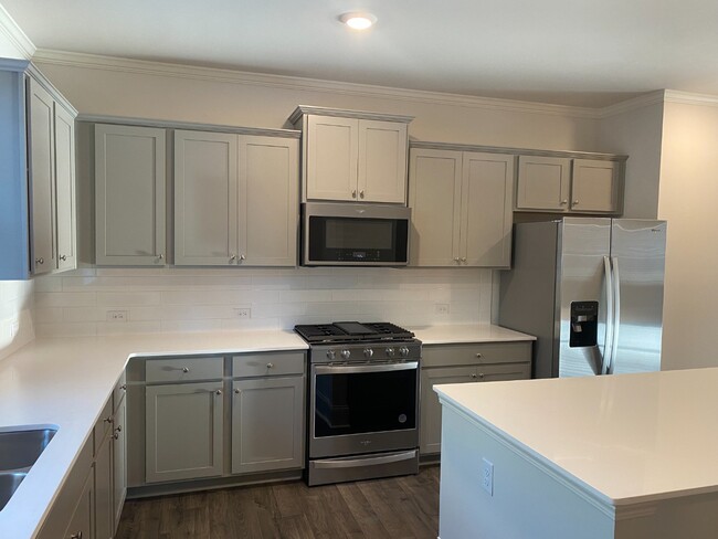 Building Photo - Modern 3-Story Townhome Near Woodstock High & Middle School