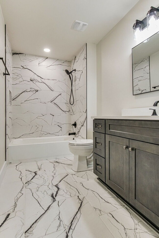 Building Photo - This luxurious new custom home in the sought-after Shadow Grove subdivision is a masterpiece of m...