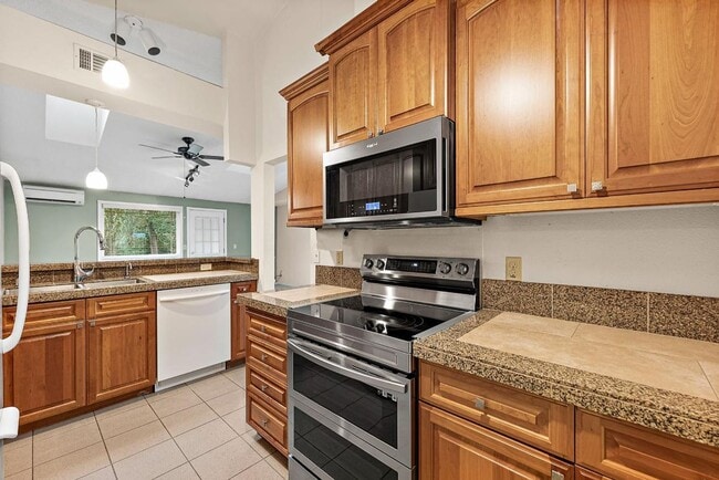 Building Photo - Charming Tacoma Home with A/C, RV Parking, Workshop & Skylit Living Room