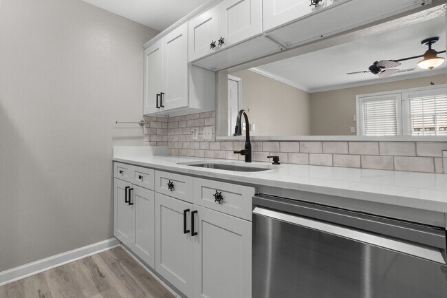 Building Photo - Welcome to Harbor Landing Condominiums — where coastal living meets convenience!