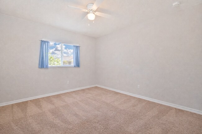 Building Photo - Spacious Three-Bedroom Home with Open Floor Plan, Large Yard & Screened Patio