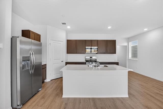 Building Photo - 7007 Cottonseed Dr