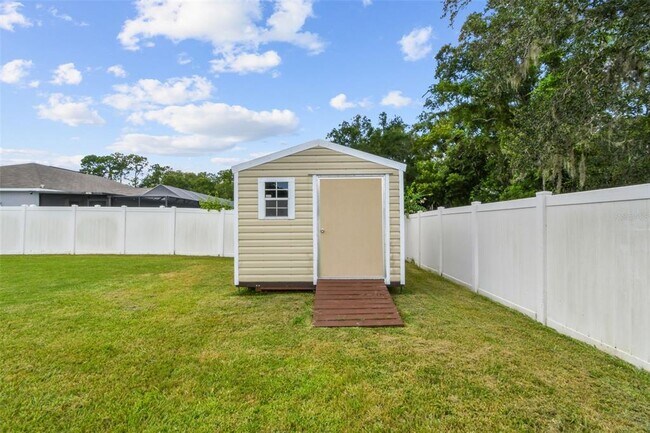 Building Photo - 6937 Minaxi Dr