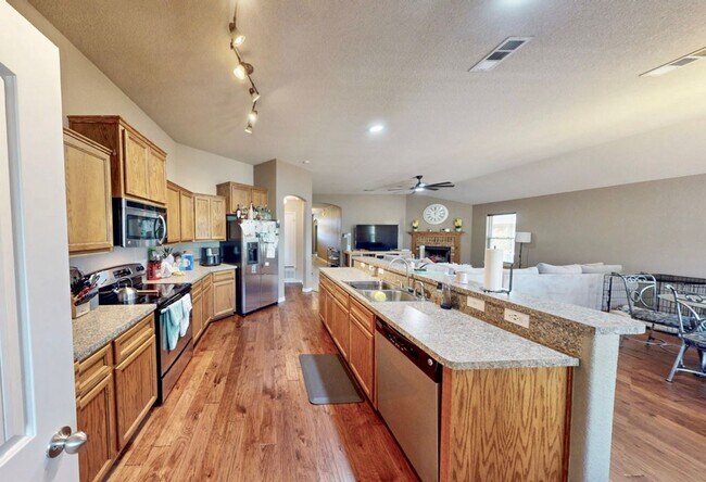 Building Photo - LIMITED-TIME MOVE-IN SPECIAL: Two Weeks Free Rent! Spacious 3 Bedroom, 2 Full Bath, with Attached...