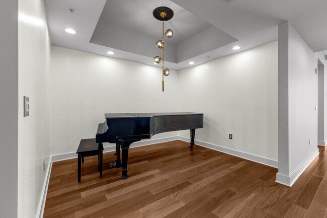 Building Photo - “Sleek Design Meets Walkable Downtown Livi...