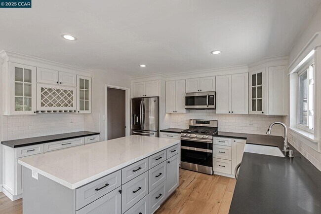 Building Photo - 5891 Caulfield Dr