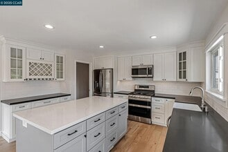 Building Photo - 5891 Caulfield Dr