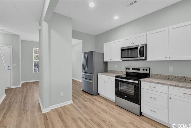 Building Photo - Gorgeous 2 bed 2.5 bath condo at Kiskadee Parke