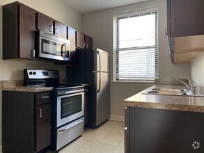 Bright kitchen with stainless steel appliances - 801-13 W. Cornelia