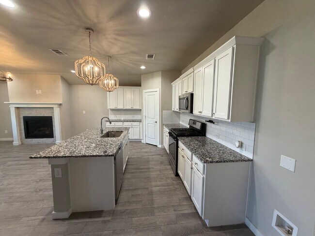 Building Photo - * MOVE IN SPECIAL * Beautiful 4 Bedroom 2 Bath Home in Wollforth Near a Beautiful Park!