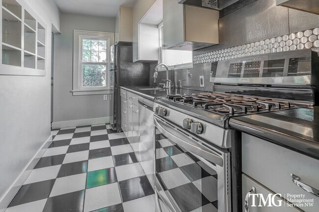 Building Photo - Updated 1928 Tutor w/ Original Touches and Large Fully Fenced Back Yard