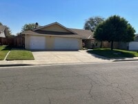 Building Photo - Nice 5 bedroom home with a large garage.