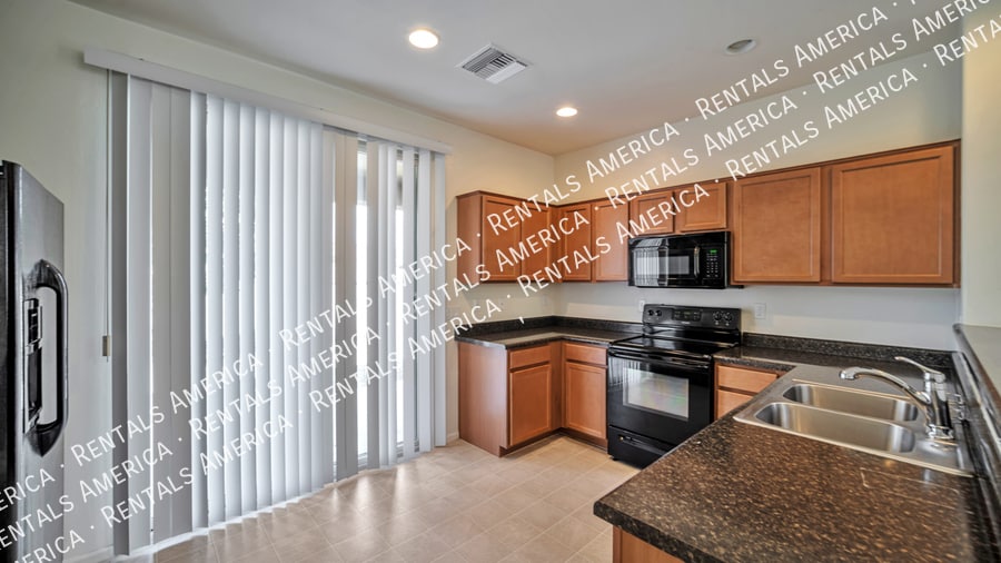 Building Photo - 6678 W Fishermans Dr