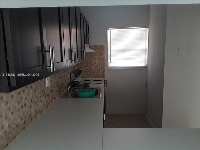 Building Photo - 3675 W 11th Ave