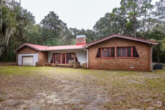 Building Photo - Tucked Away Three Bedroom Home