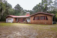 Building Photo - Tucked Away Three Bedroom Home