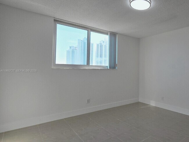 Building Photo - 19380 Collins Ave