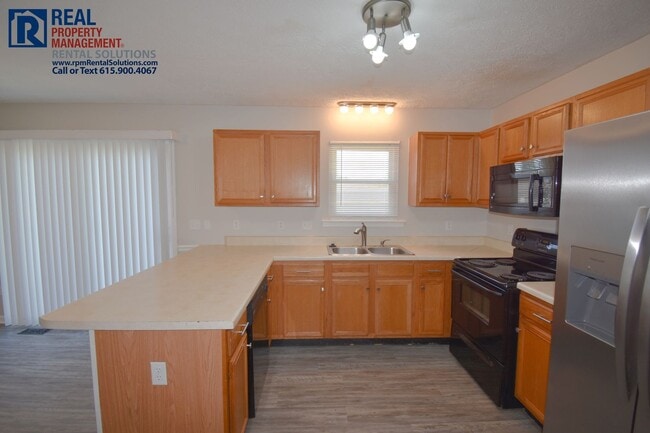 Building Photo - Adorable 3BR/2BA, attached 2 car garage in N. Murfreesboro on a corner lot!
